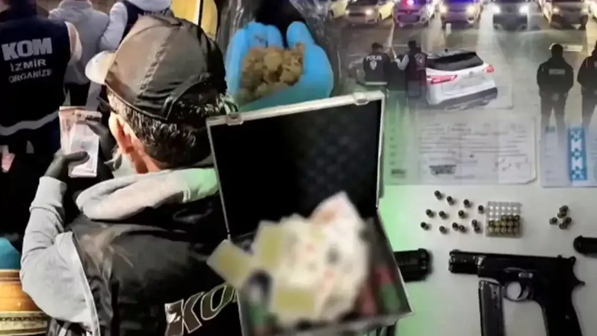 İzmir'de düzenlenen tefecilik operasyonunda gözaltına alınan şüpheliler.