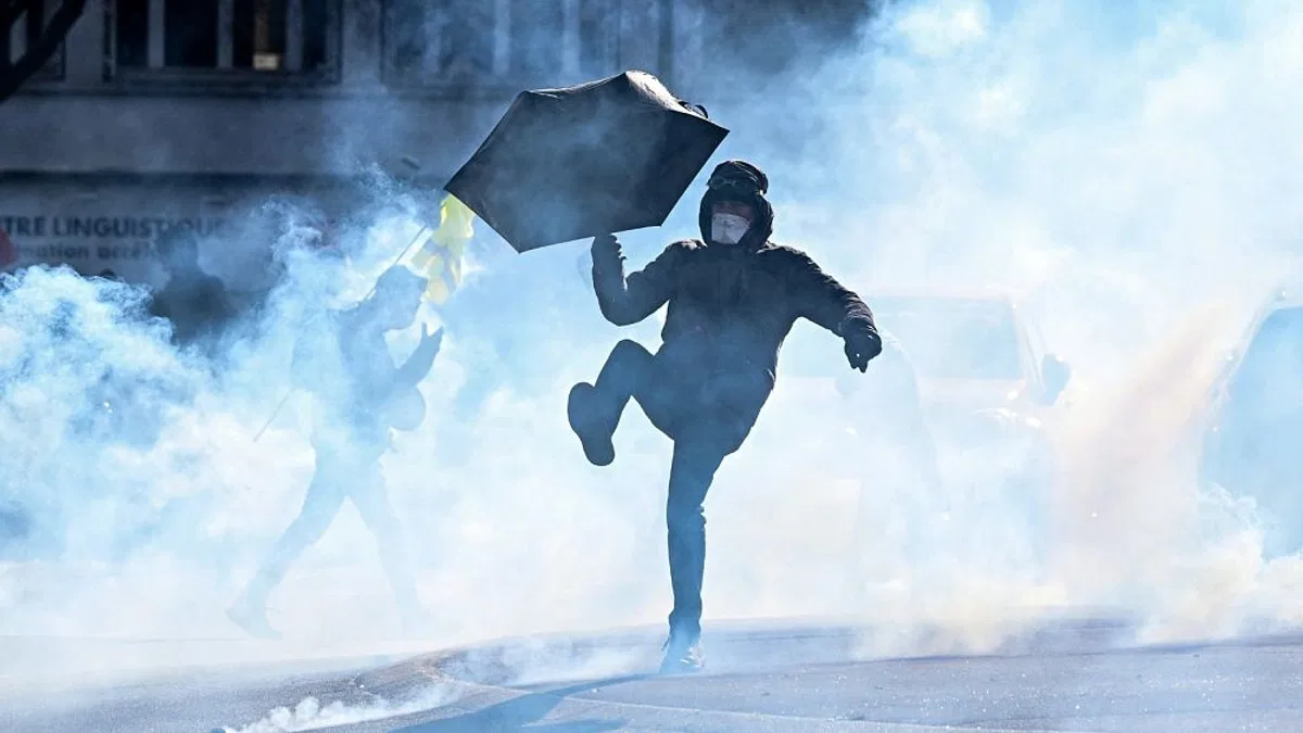 Tear gas and protests as pension strikes in France impact electricity and fuel supplies