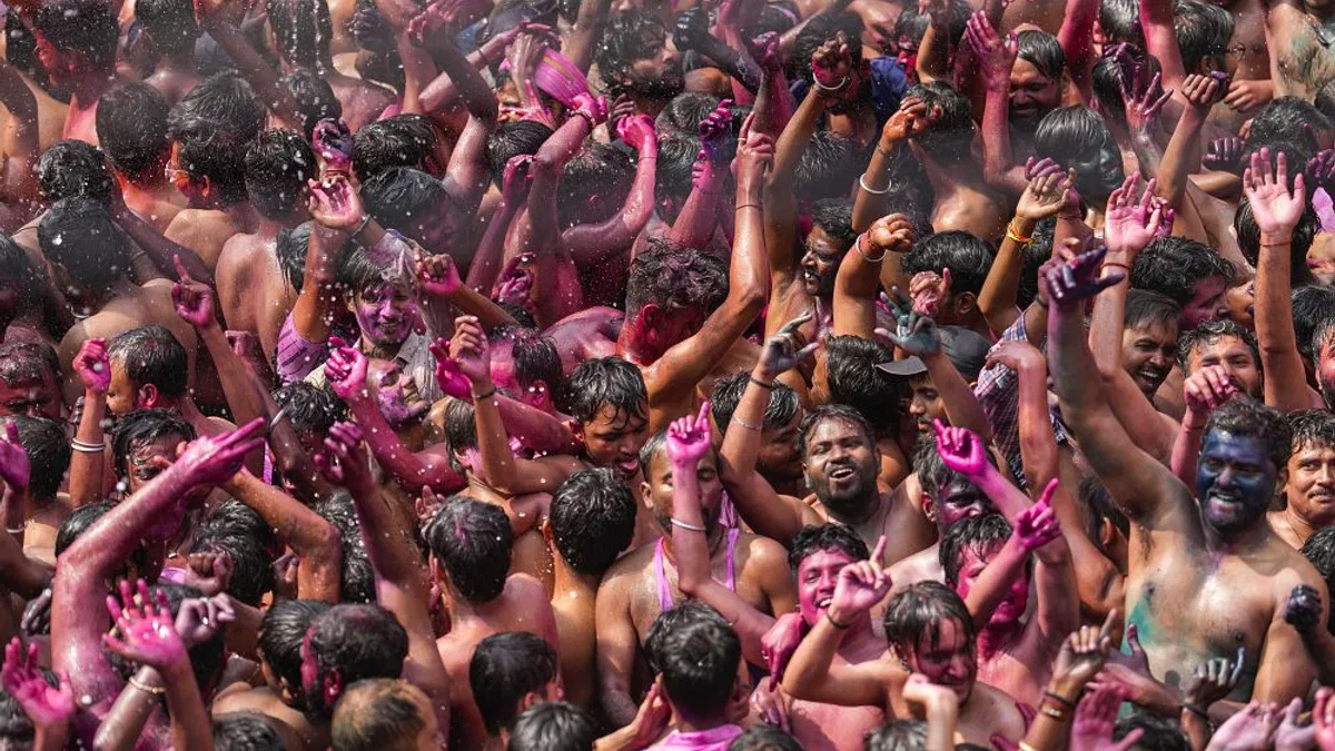 India soaks in colours for Holi festival